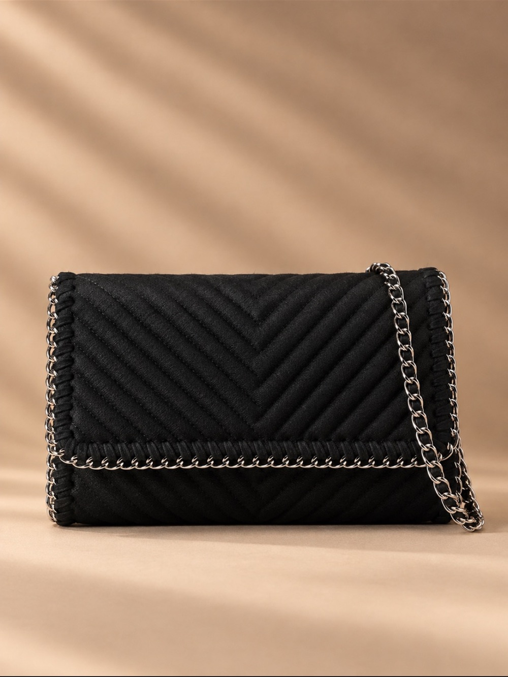 Chelsea28 Clutch in Black Faux leather with silver hardware